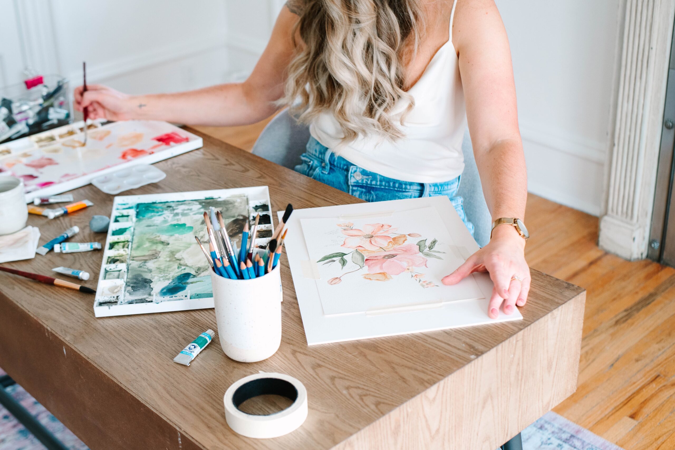 calgary brand photographer ; watercolour artist painting a floral bouquet